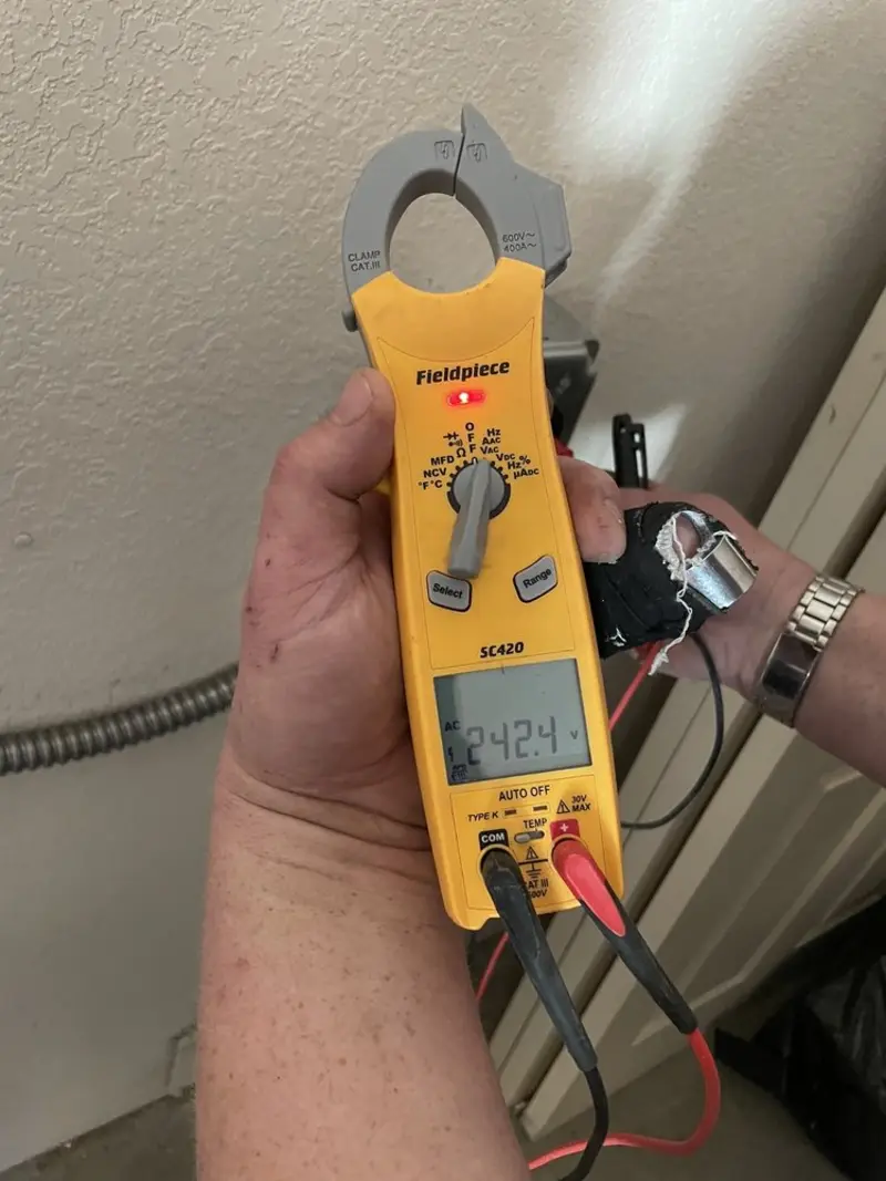 Voltage testing with clamp meter during Generator Installation in West Carson
